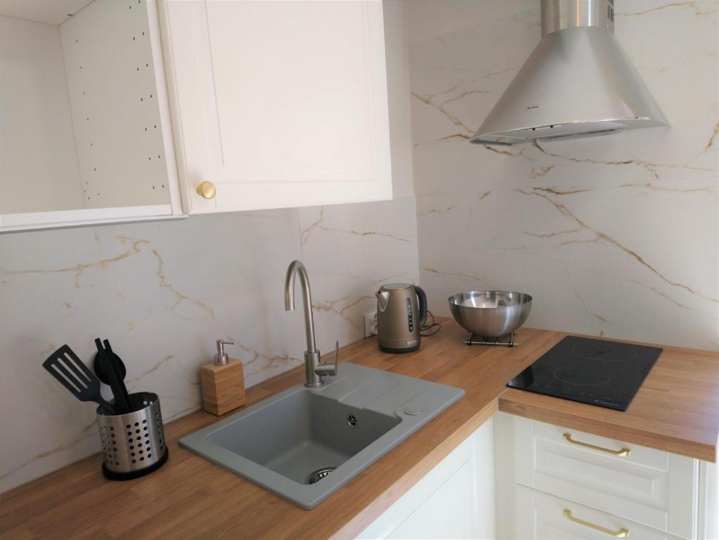 Kuchyňa alebo kuchynka v ubytovaní Nowe Apartamenty na Gryfa