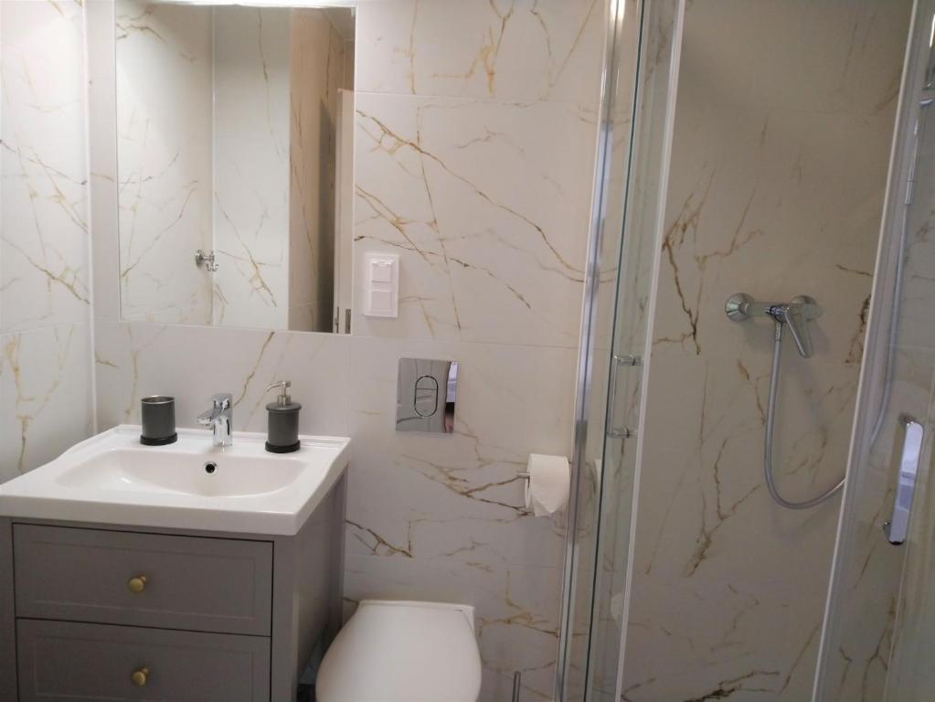 Kúpeľňa v ubytovaní Nowe Apartamenty na Gryfa