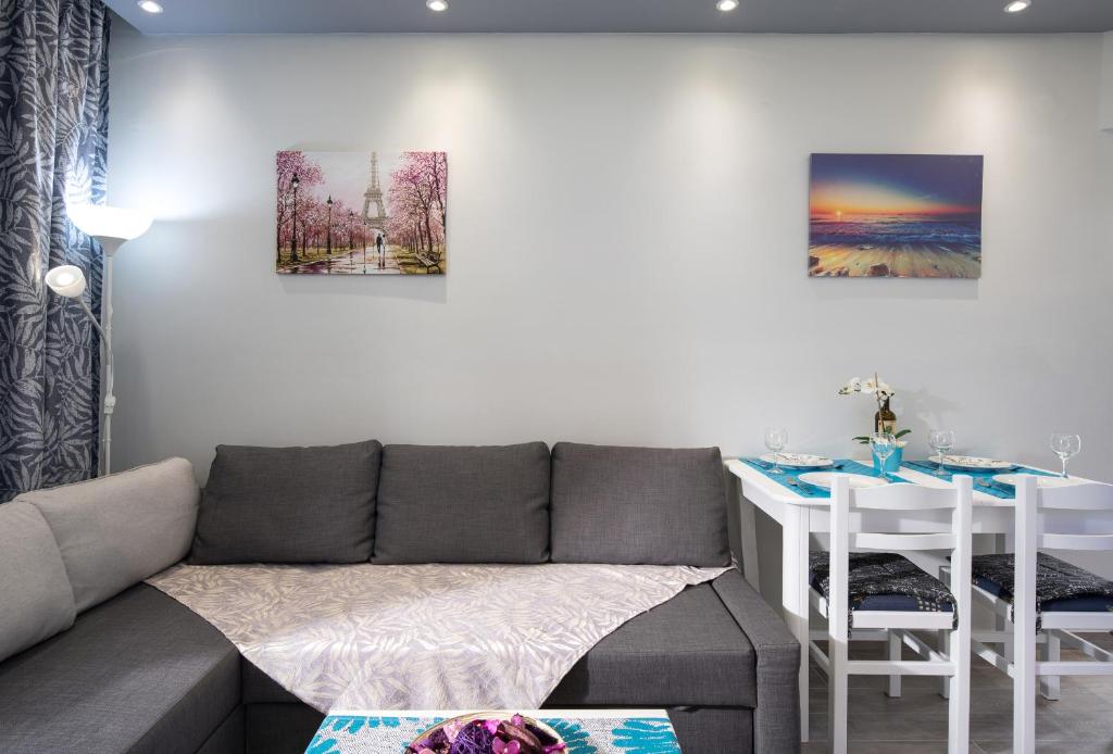 Posezení v ubytování Leonardo Apartamente