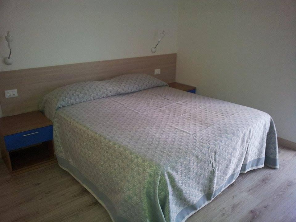 En eller flere senge i et værelse på B&B La Paranza