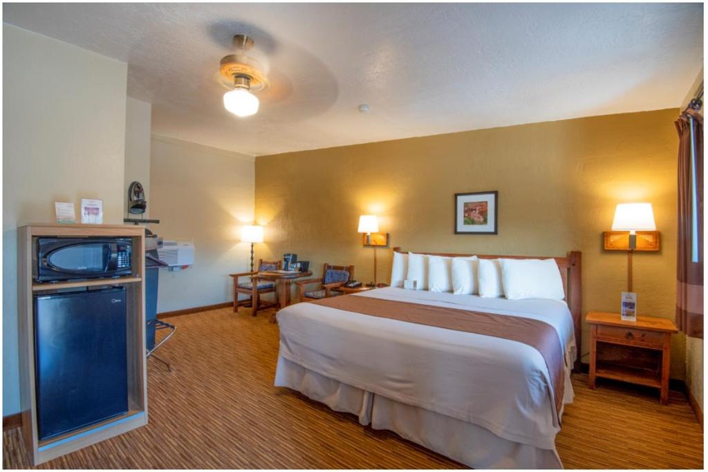 Letto o letti in una camera di Thunderbird Lodge