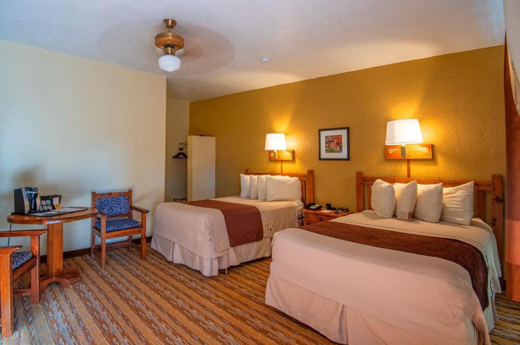 Letto o letti in una camera di Thunderbird Lodge