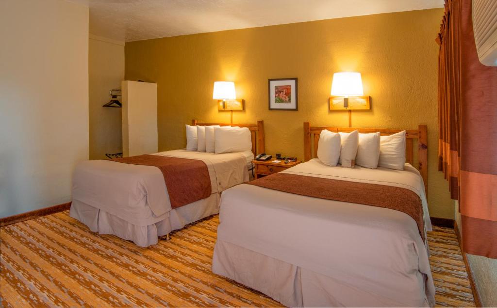 Letto o letti in una camera di Thunderbird Lodge
