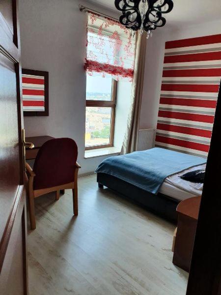 Postel nebo postele na pokoji v ubytování Sea Towers Gdynia