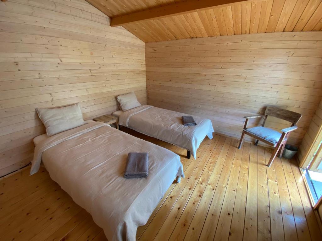 Postel nebo postele na pokoji v ubytování Suurkivi Nature Escape