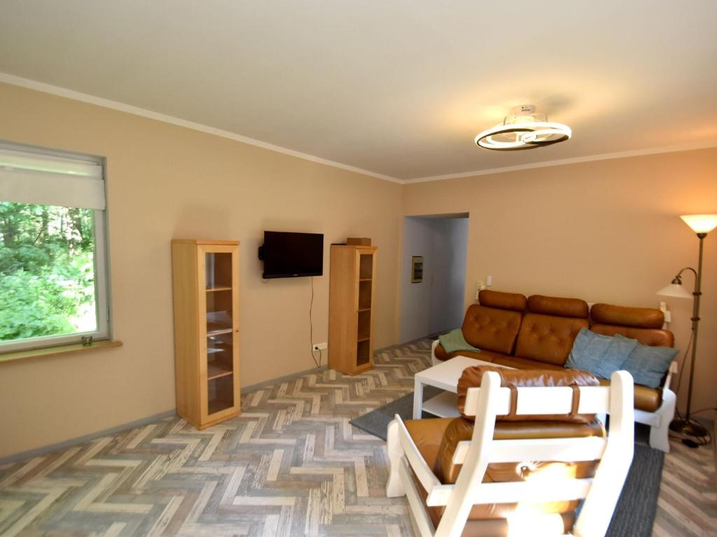 TV a/nebo společenská místnost v ubytování Holiday Home in Harz near Ski Slopes