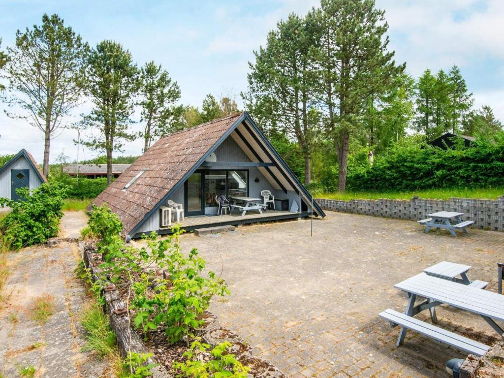 a tiny house with a pitched roof at 6 person holiday home in Ebeltoft in Ebeltoft