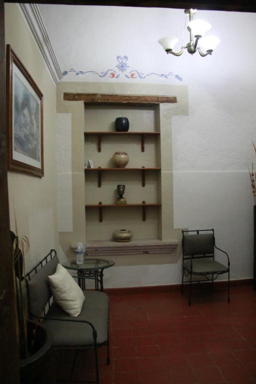 Posezení v ubytování Casa de los Dulces Sueños