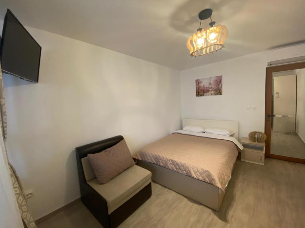 Ένα ή περισσότερα κρεβάτια σε δωμάτιο στο Къща за гости детелина - лина