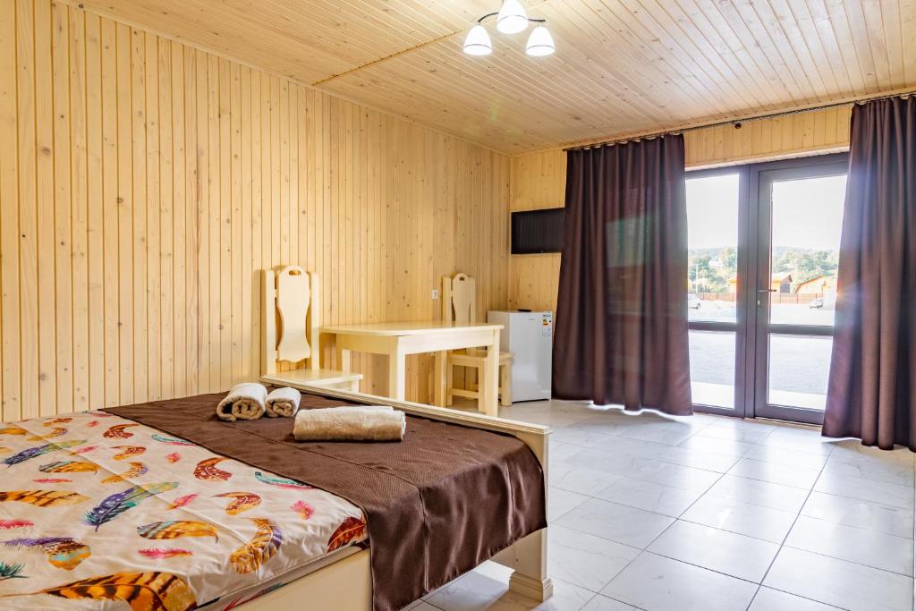 Postel nebo postele na pokoji v ubytování Nikoletta
