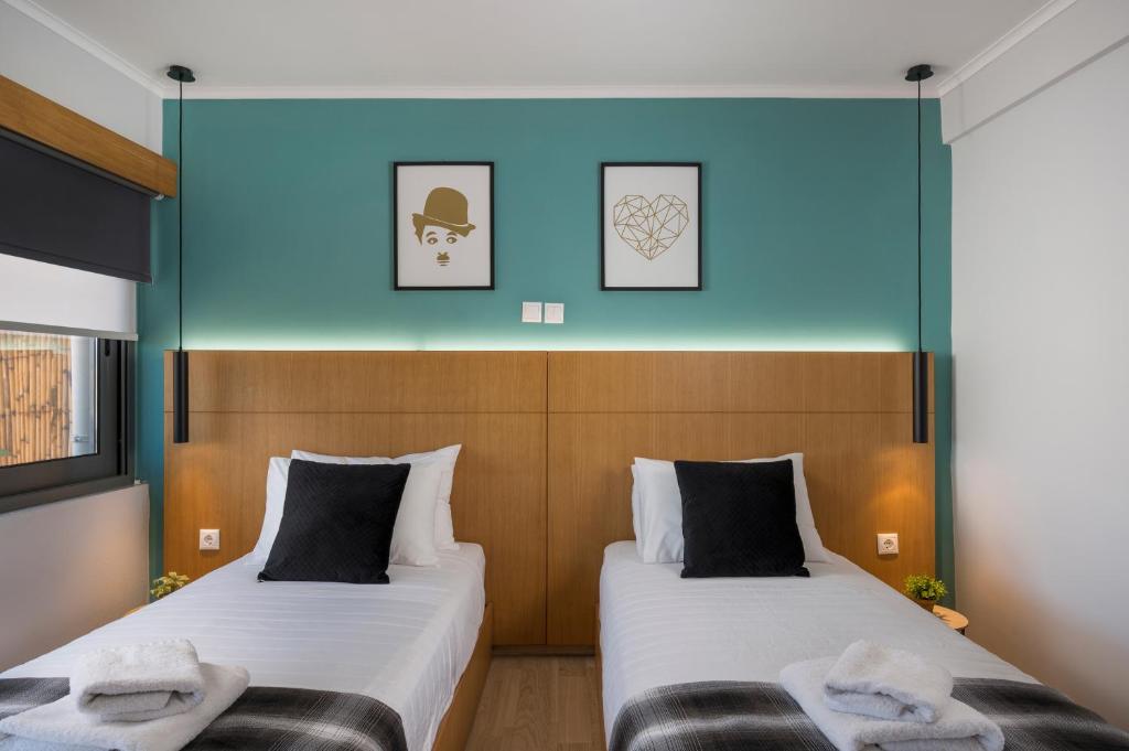 A bed or beds in a room at Nidus Villa