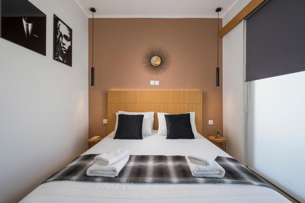 A bed or beds in a room at Nidus Villa