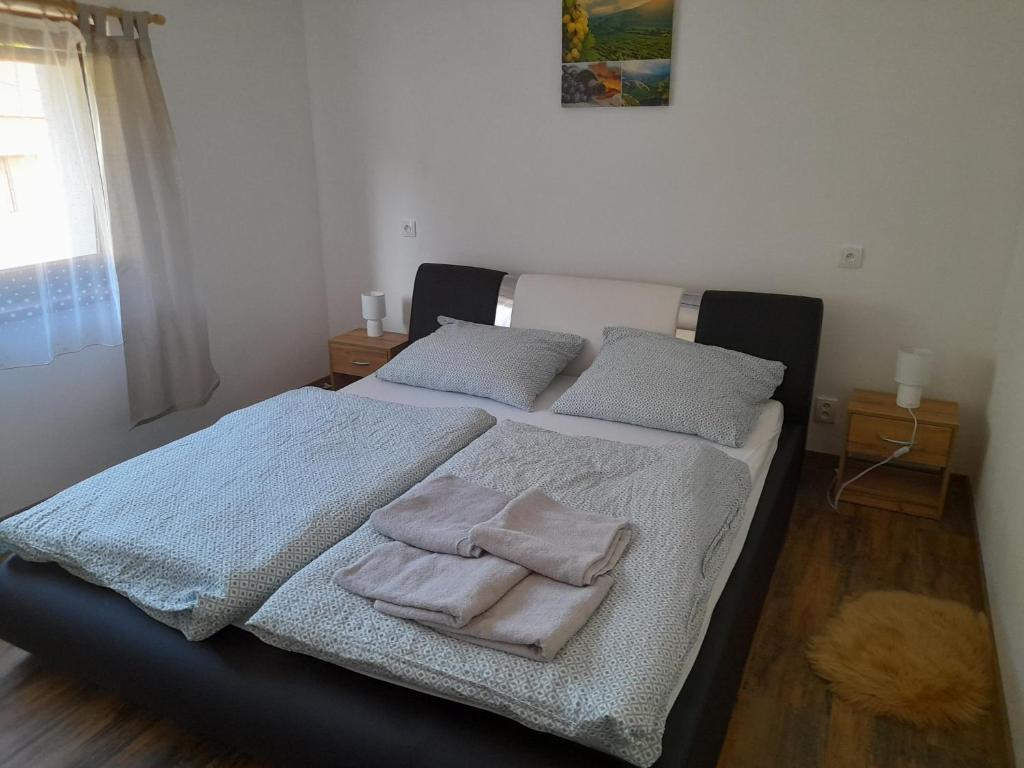 Postel nebo postele na pokoji v ubytování Pohoda Salaš u Velehradu-2 apartmany