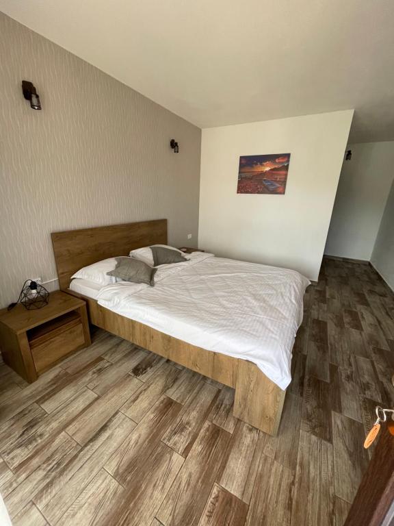 Postel nebo postele na pokoji v ubytování Mustaciosul Dunarii