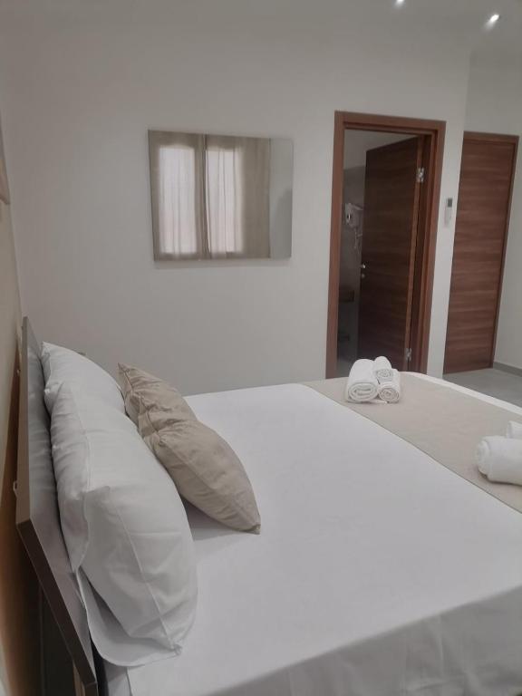 Letto o letti in una camera di BeB Coccinella