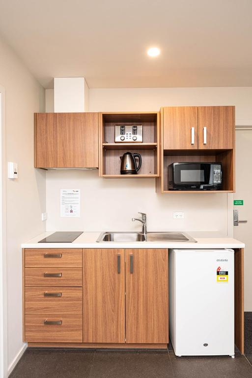 Kuchyň nebo kuchyňský kout v ubytování 311 Motel Riccarton