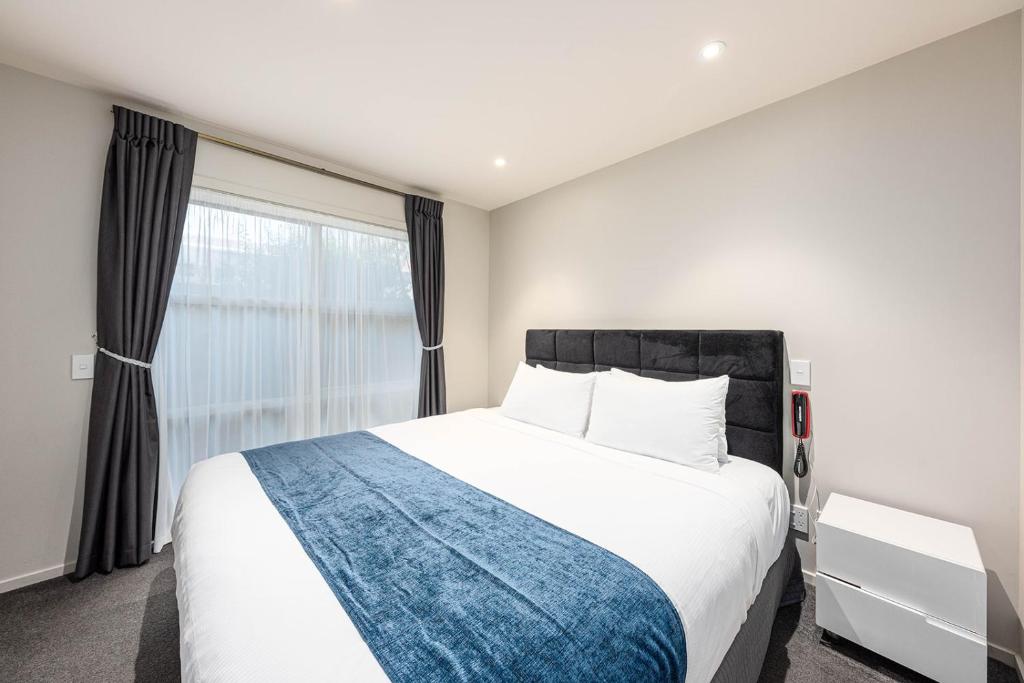 Postel nebo postele na pokoji v ubytování 311 Motel Riccarton