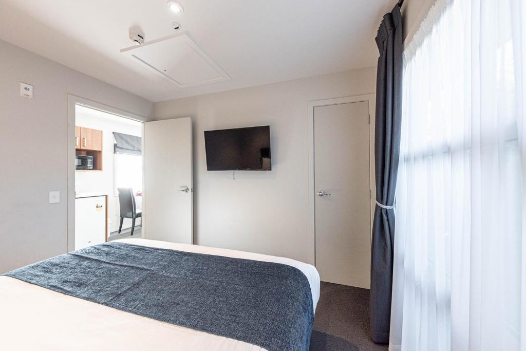Postel nebo postele na pokoji v ubytování 311 Motel Riccarton
