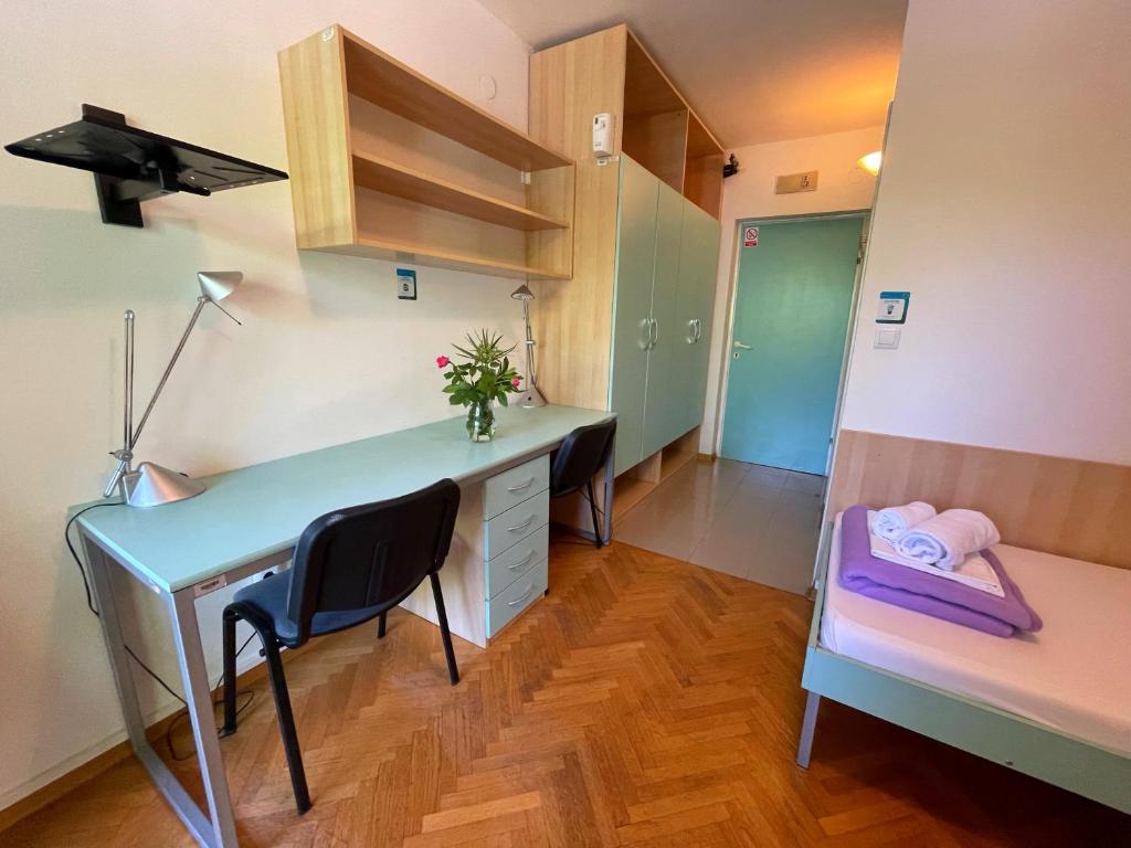 Postelja oz. postelje v sobi nastanitve Hostel Spinut
