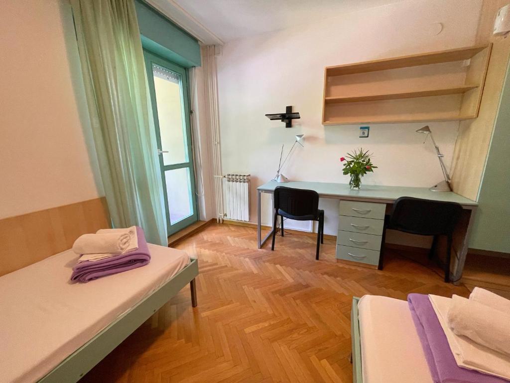 Postelja oz. postelje v sobi nastanitve Hostel Spinut