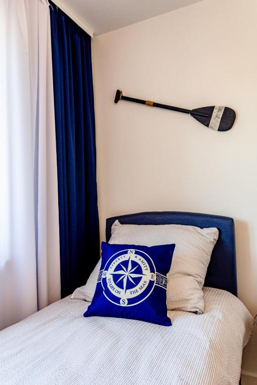 Postel nebo postele na pokoji v ubytování Hostel & Apartments Kołobrzeg