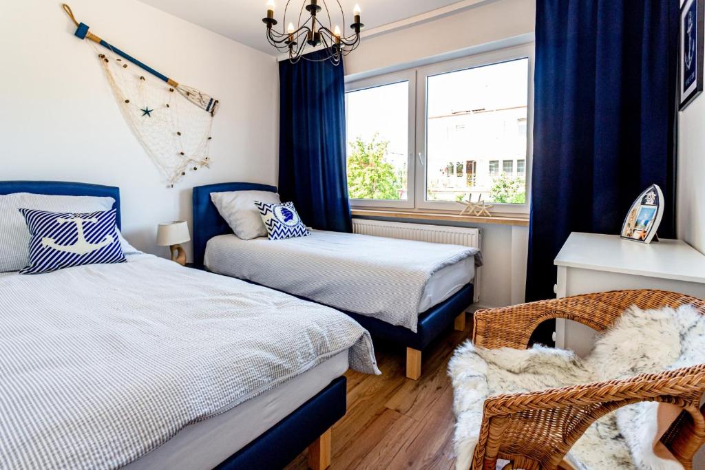Postel nebo postele na pokoji v ubytování Hostel & Apartments Kołobrzeg