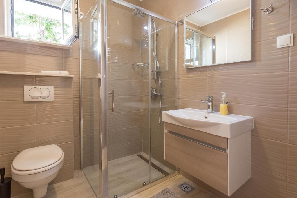 Koupelna v ubytování Apartments Sanja