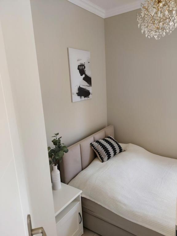 Postel nebo postele na pokoji v ubytování Maritima's Home