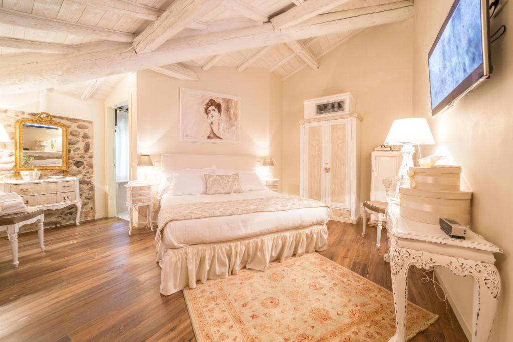 Krevet ili kreveti u jedinici u objektu Maison Resola - Rooms & Breakfast