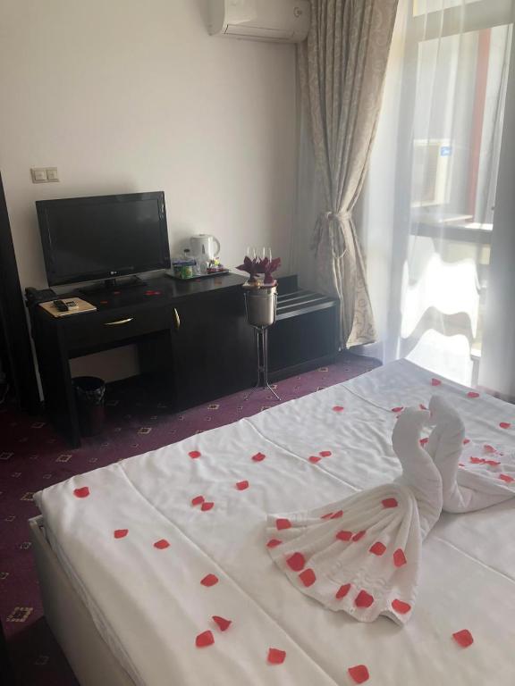 Een bed of bedden in een kamer bij Hotel Bulevard Predeal