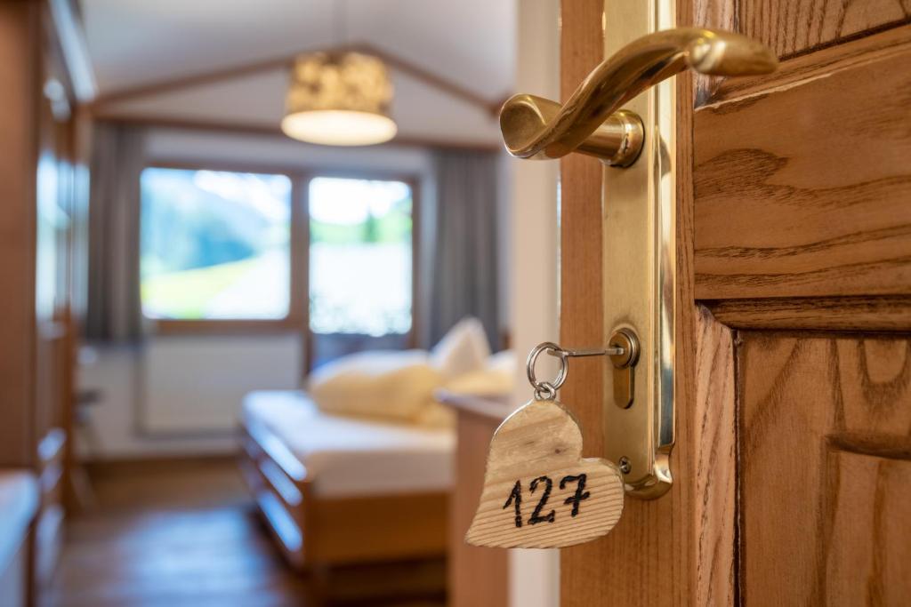 Postel nebo postele na pokoji v ubytování Hotel Jäger 3Sterne Superior