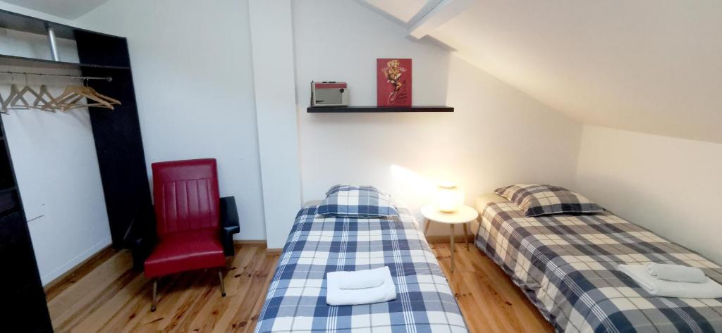 Postel nebo postele na pokoji v ubytování Les Embruns