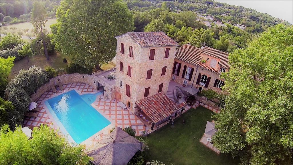 an overhead view of a large house with a swimming pool at Domaine De Sainte Annette in Callian
