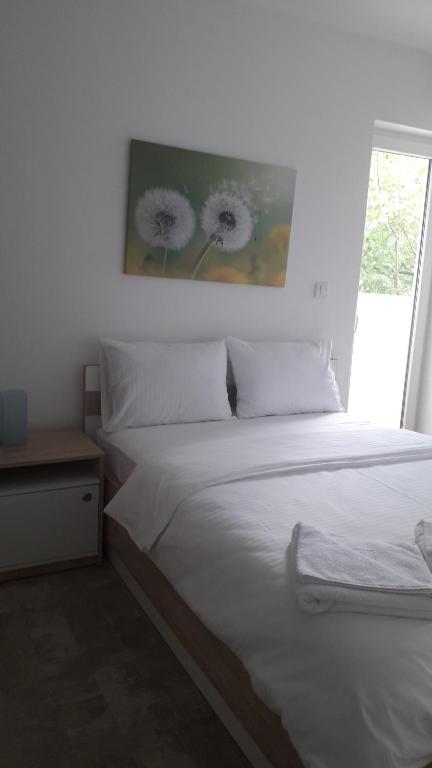 Postel nebo postele na pokoji v ubytování Villa Boho Cherga