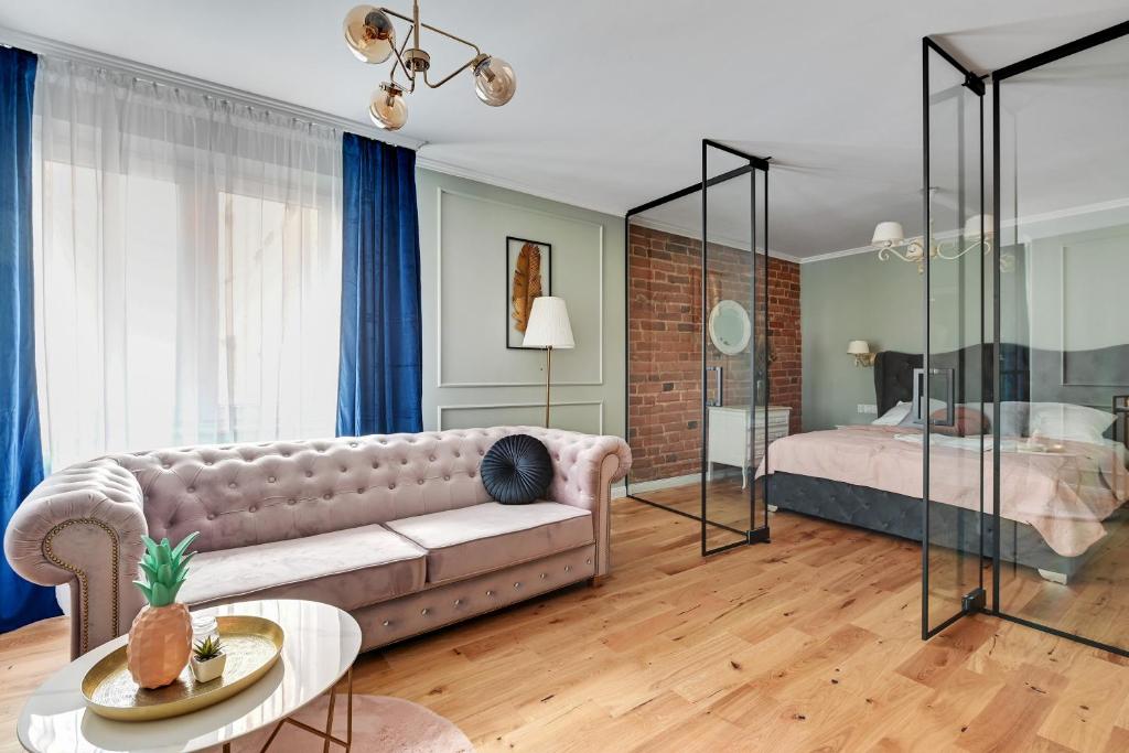 Posteľ alebo postele v izbe v ubytovaní Warzywnicza Old Town Apartment