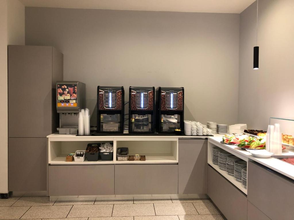 Kuchyň nebo kuchyňský kout v ubytování Hotel Aldebaran