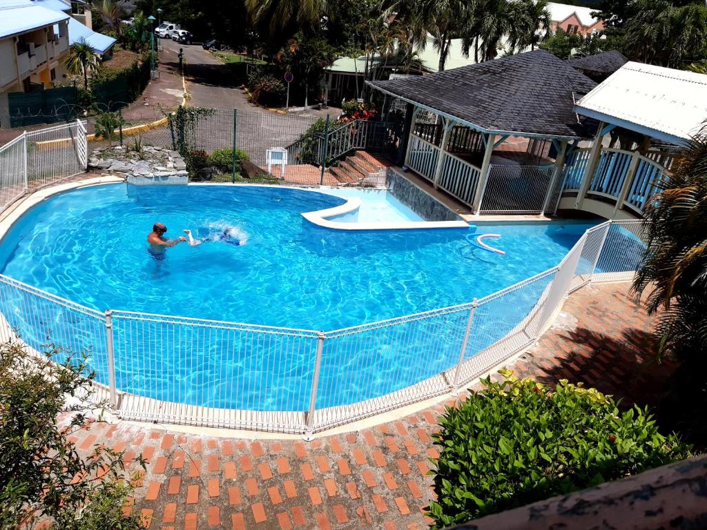 Bazén v ubytování Studio Climatisé - Piscine-Plage - 1 à 2 personnes nebo v jeho okolí