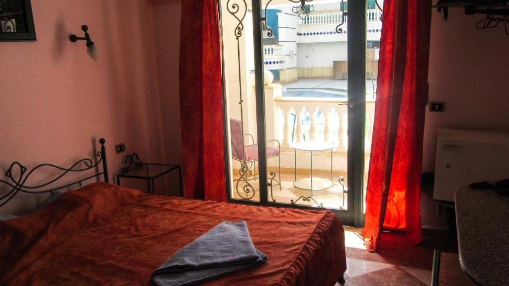 Postel nebo postele na pokoji v ubytování La Reine Dahab Hotel