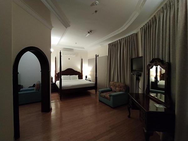Katil atau katil-katil dalam bilik di Al Khariss Hotel