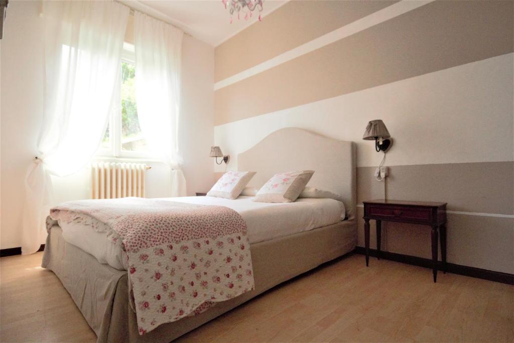 Postel nebo postele na pokoji v ubytování Lakeside relais
