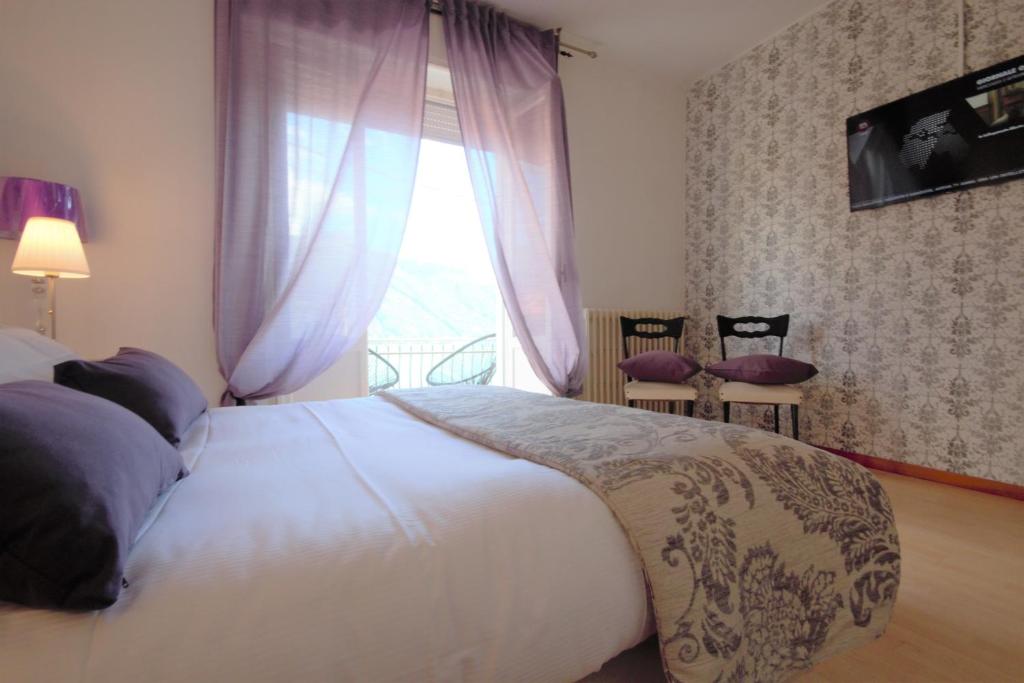 Postel nebo postele na pokoji v ubytování Lakeside relais