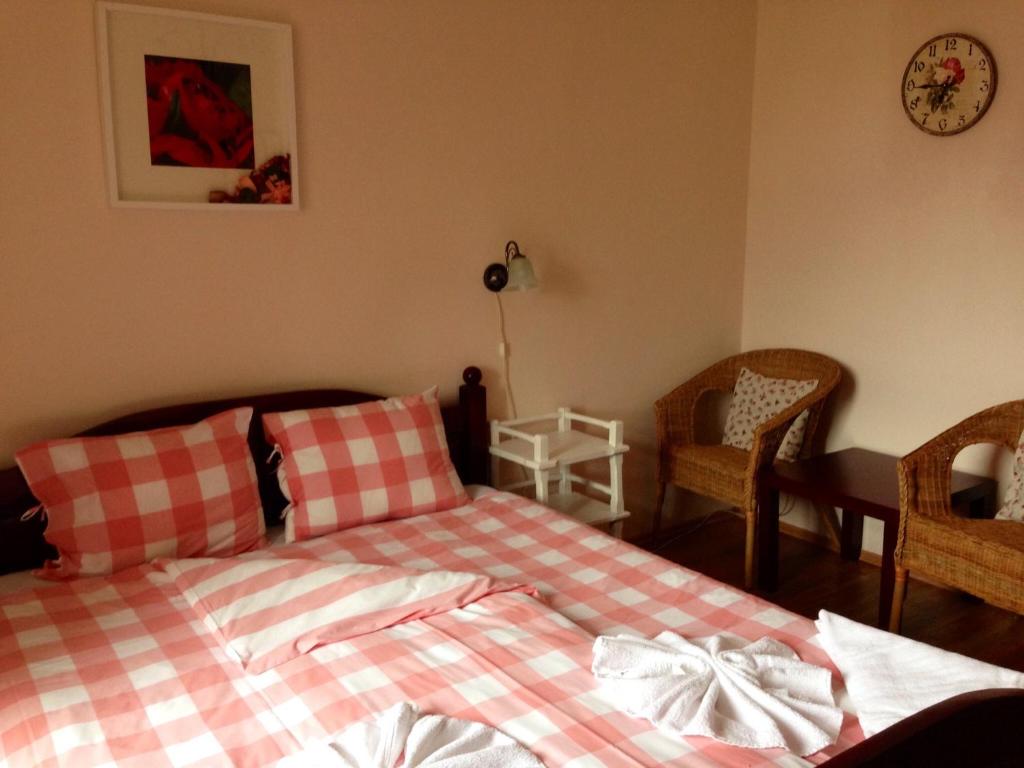 Postel nebo postele na pokoji v ubytování Garni Hotel St Anna
