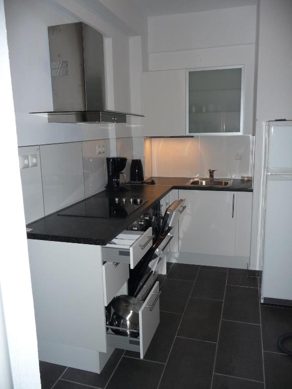 Kuchyň nebo kuchyňský kout v ubytování Residence La Scala