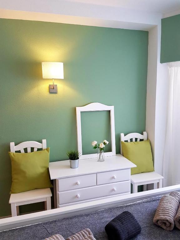 Postel nebo postele na pokoji v ubytování Apartamentos Tamarindos