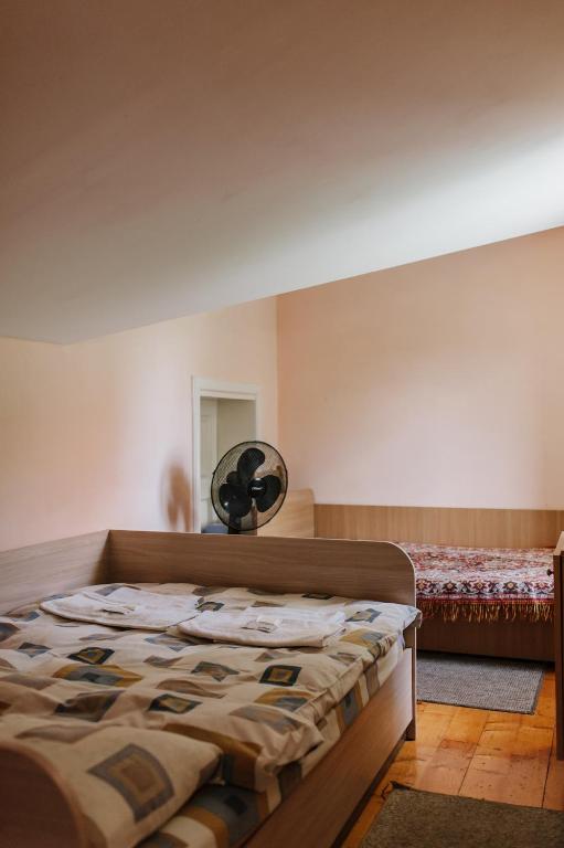 Postel nebo postele na pokoji v ubytování Mala Praha