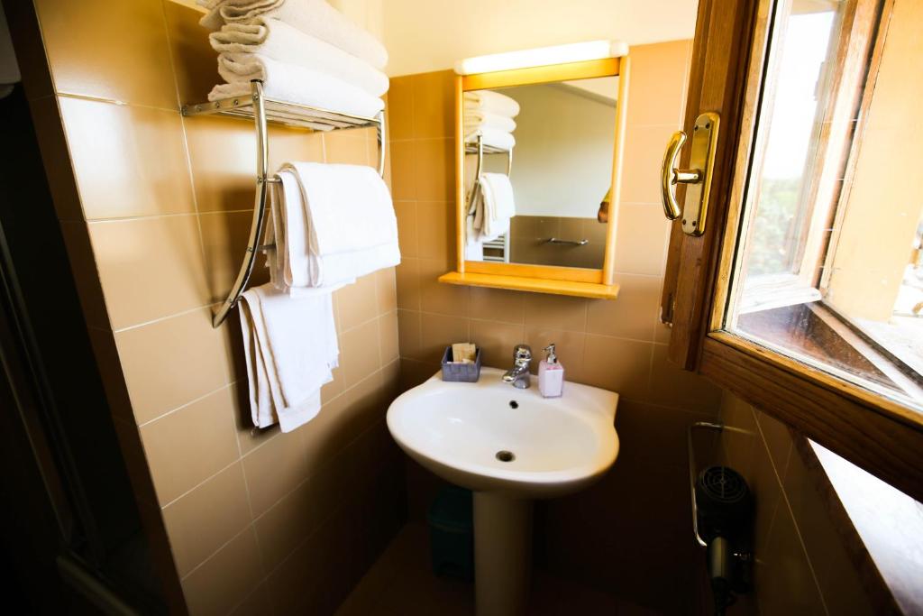 Koupelna v ubytování Hotel Benedetti