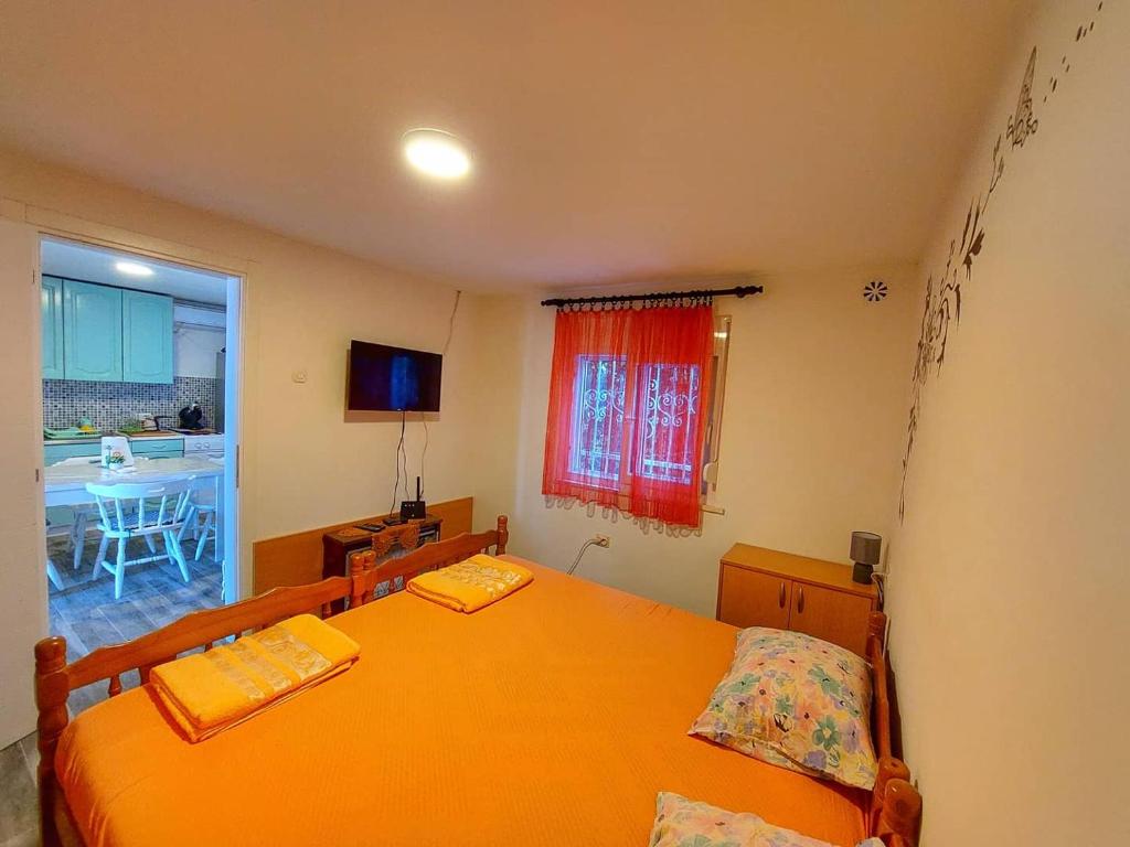 Postel nebo postele na pokoji v ubytování Apartments Marina