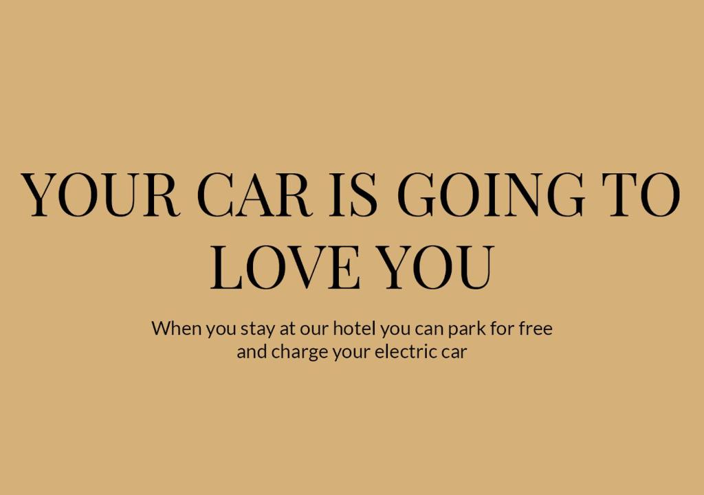 a sign that says your cars is going to love you at Aalborg Airport Hotel in Aalborg