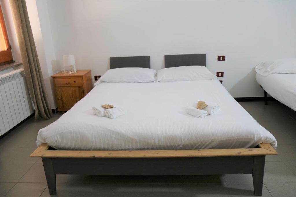 Postel nebo postele na pokoji v ubytování Parco Hotel Granaro
