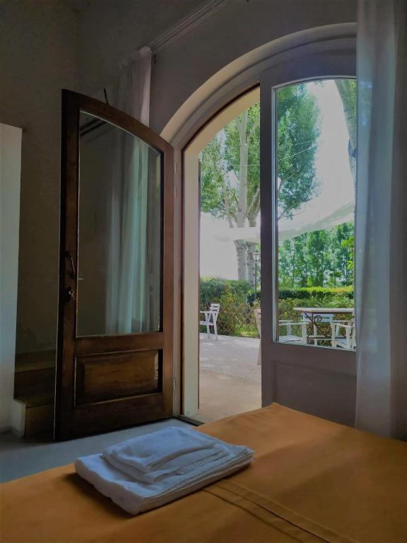 Postel nebo postele na pokoji v ubytování Hotel Villaggio Le Stelline
